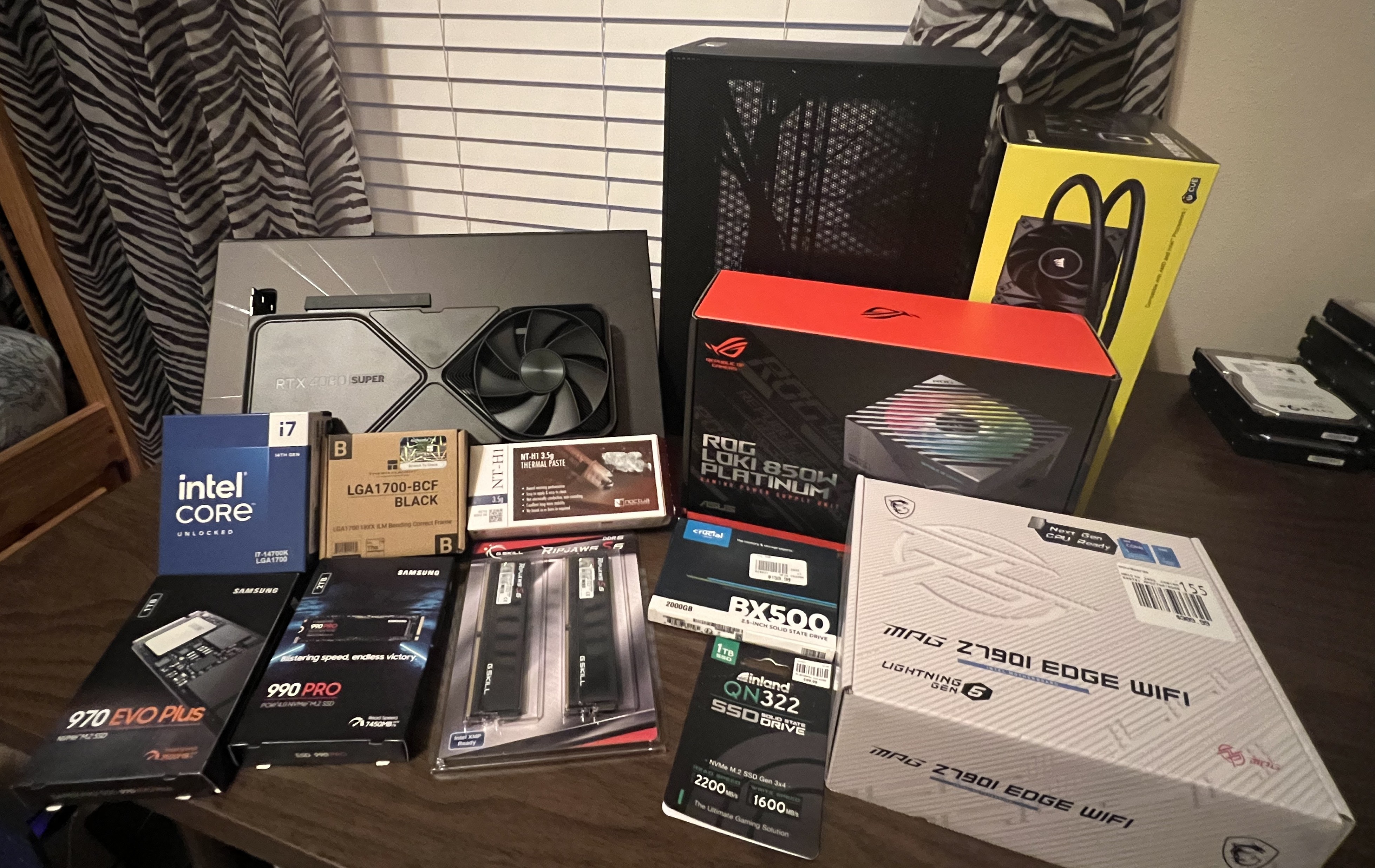 All components laid out on the desk pre-build
