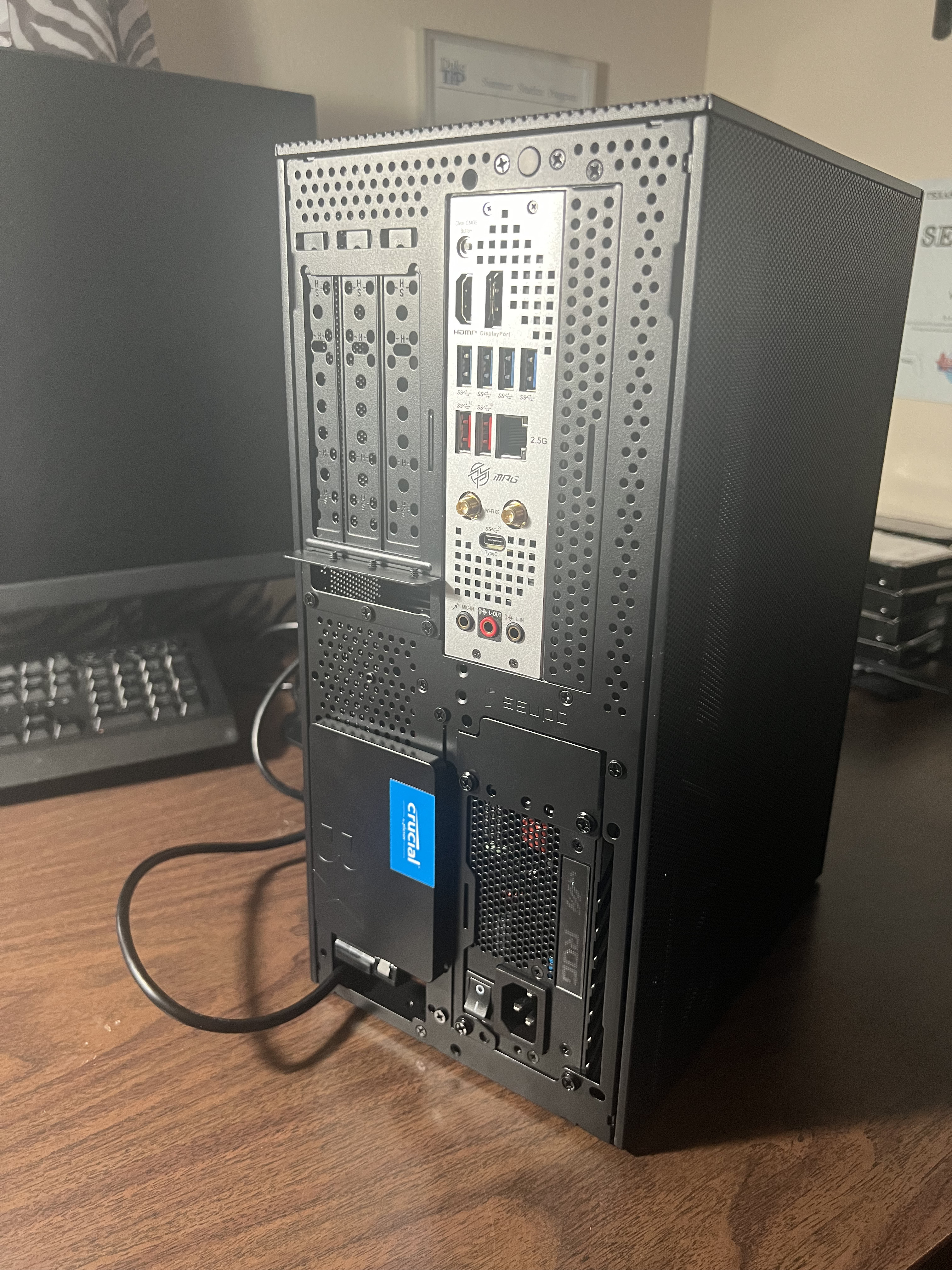 SATA SSD mounted on the back of the case