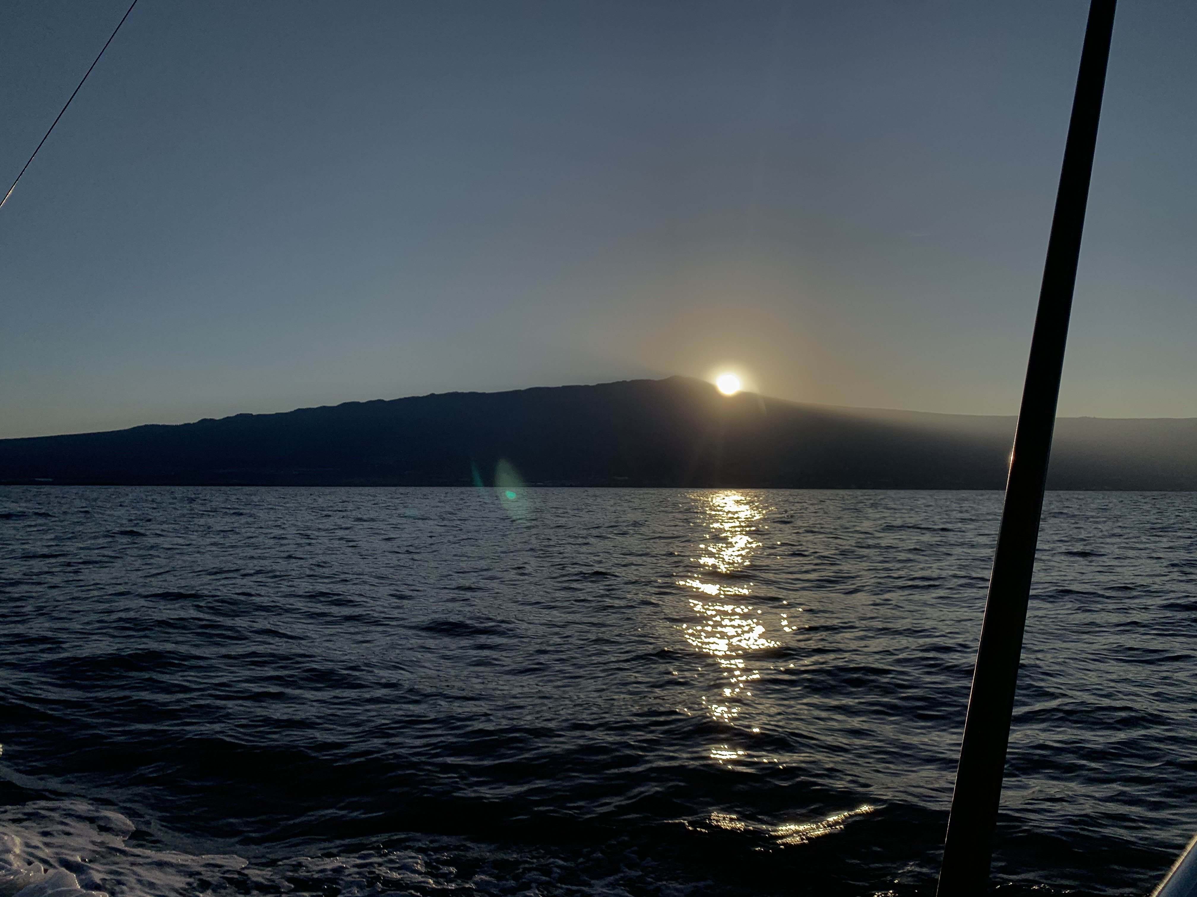 Sunrise over Kona from the boat